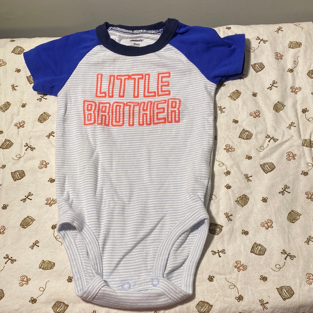 Carter’s blue baby bodysuit